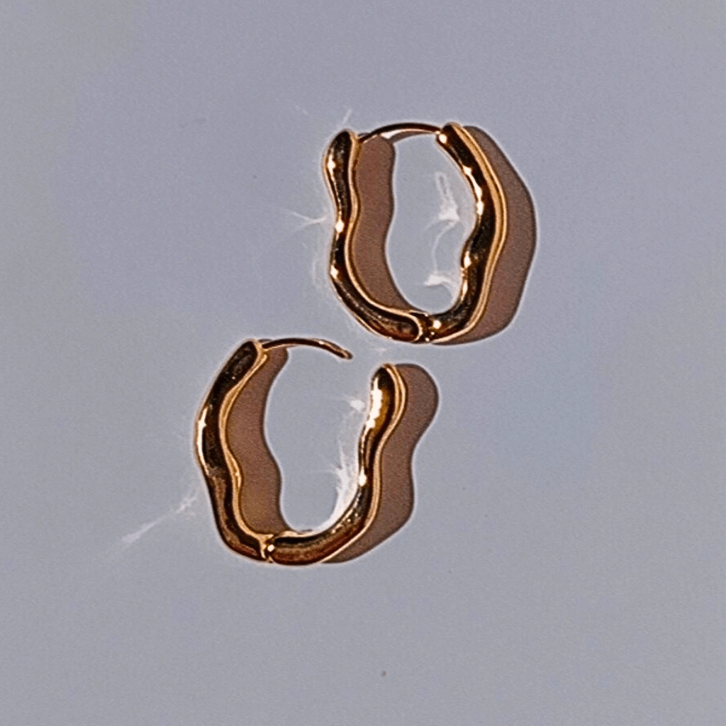 Pendientes de aro Irregulares dorado acero inox