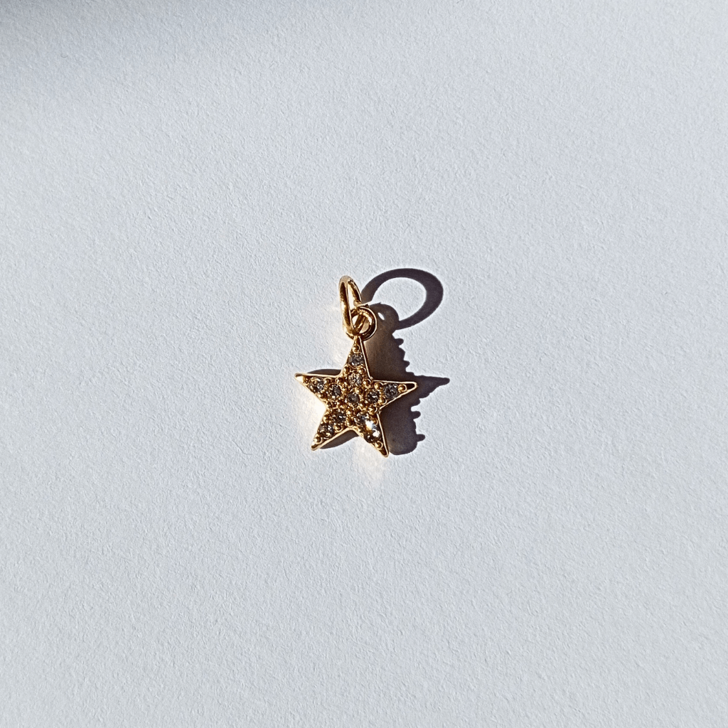 Colgante con  Forma De Estrella con cristales blanco Elaborada en Acero Inoxidable 304 Recubrimiento PVD  y Bañada  En Oro Auténtico Colgante Accesorios De Joyería hhedderich joyeria España