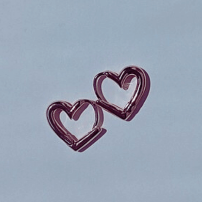 Imagen de Aros de Pendientes forma de Corazón Mini en color Oro Rosa de hhedderich.com
en fondo blanco