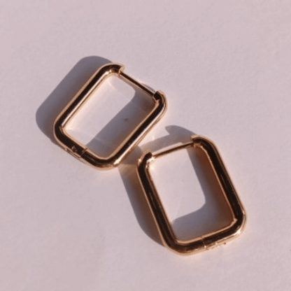 Pendientes aro Rectangulares cierre clip dorado fondo rosa